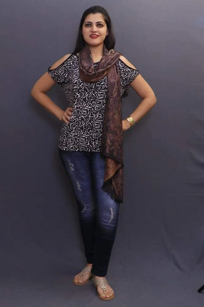 Delicate Wrap Along With Black Colour Base And Amazing Overall Paisley Pattern Looks Quite Unique.